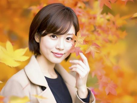 若い女性と紅葉　AI生成画像   の写真