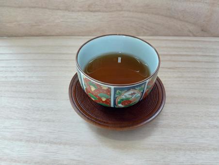 湯呑に入れたウーロン茶 湯呑に入れたウーロン茶 ウーロン茶,湯呑,茶たくの写真素材