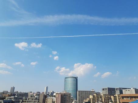 都会 ひこうき雲 都会 ひこうき雲の写真