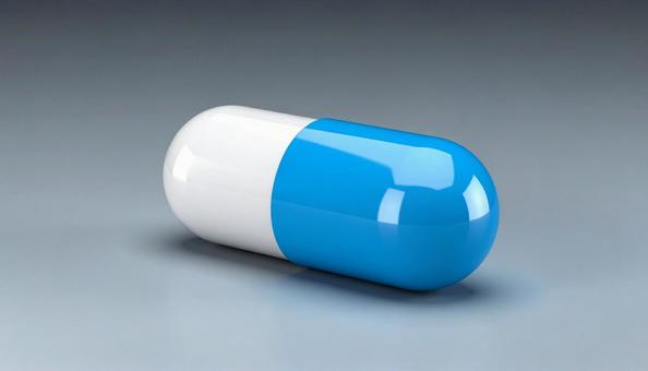 薬 カプセル青白1 薬 カプセル青白1の写真