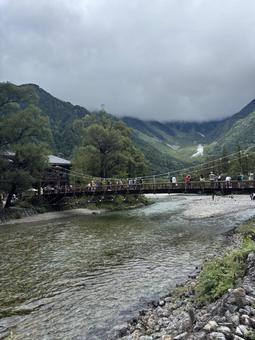吊り橋のある風景 山,川,河の写真素材