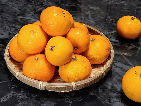 かごに山盛りのミカン みかん,柑橘類,果物の写真素材