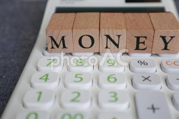 電卓とマネーの英文字 お金,家計簿,経理の写真素材