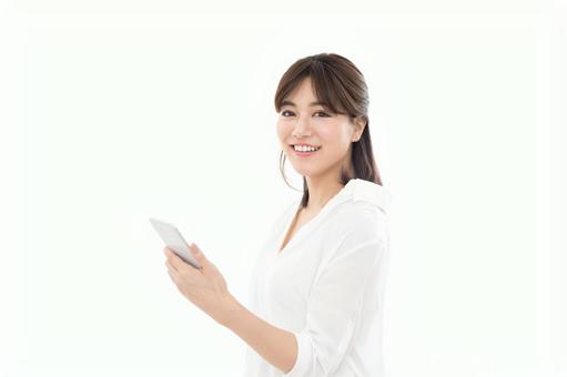 若い女性 スマートフォン 若い女性 スマートフォンの写真