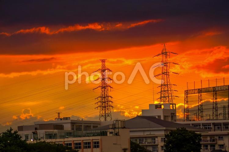 夕暮れと鉄塔のイメージ 日暮れ,空,産業の写真素材