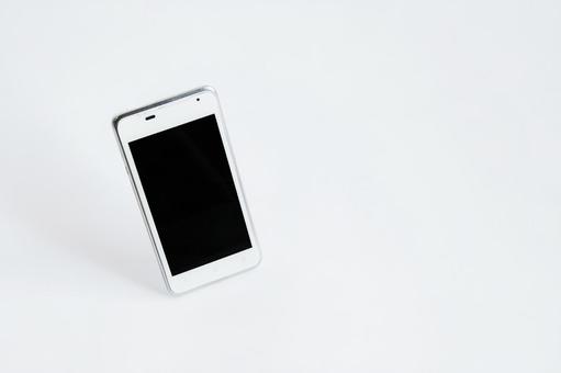 スマートフォンの白背景写真 スマートフォンの白背景写真 スマートフォン,携帯電話,白背景の写真素材