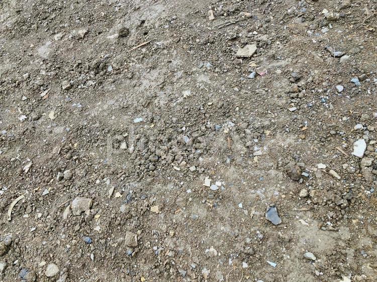 雨に濡れた建設前の土地テクスチャー 雨に濡れた,建設前,土地の写真素材