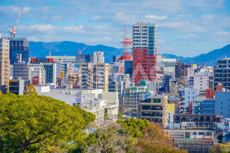 福岡市のビル群 ビル群,青空,山の写真素材