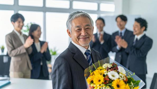 定年退職するベテラン社員 定年退職するベテラン社員の写真
