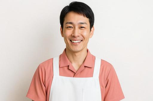 笑顔の男性介護士・福祉スタッフ・ヘルパーの写真