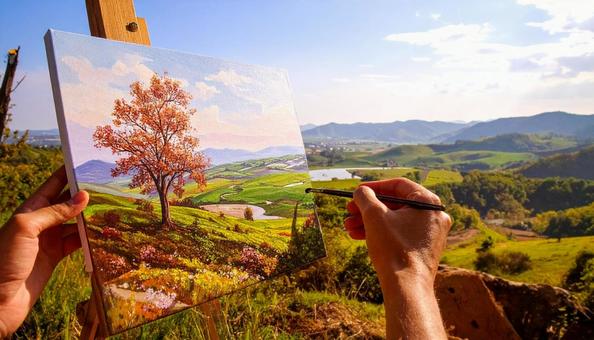 自然の緑の色を塗る手元 自然の緑の色を塗る手元の写真