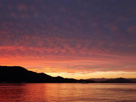 夕焼け 夕焼け 夕焼け,ビーチ,積乱雲の写真素材