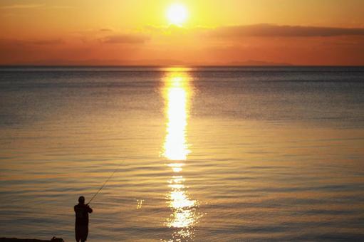 夕陽と釣り人 201109 夕陽と釣り人 201109の写真