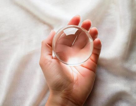 Image of a glass ball on the palm of your hand, ball, sphere, spherical, JPG