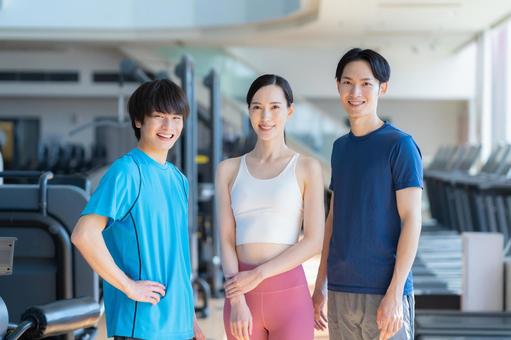 スポーツジムでトレーニングをする若い男女 スポーツジム,フィットネス,ダイエットの写真素材