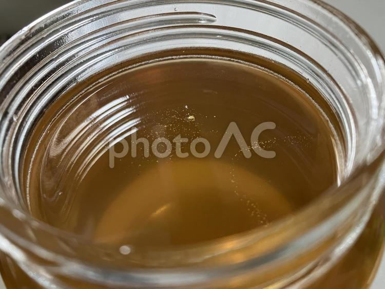 瓶の中のはちみつ おしゃれ,はちみつ,瓶の写真素材