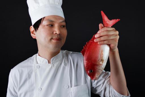 真鯛を持つ料理人 料理人,シェフ,真鯛の写真素材