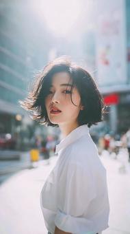 日差しに輝く髪:ストリートのポートレート 日差しに輝く髪:ストリートのポートレートの写真