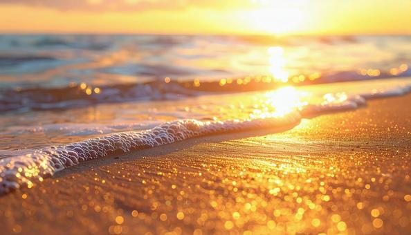波に映るサンセットゴールドの写真
