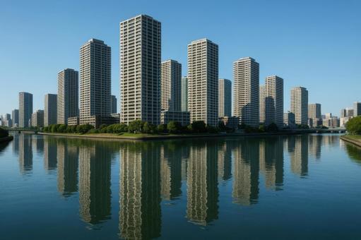 タワマン群と河川のリフレクション タワマン群と河川のリフレクションの写真