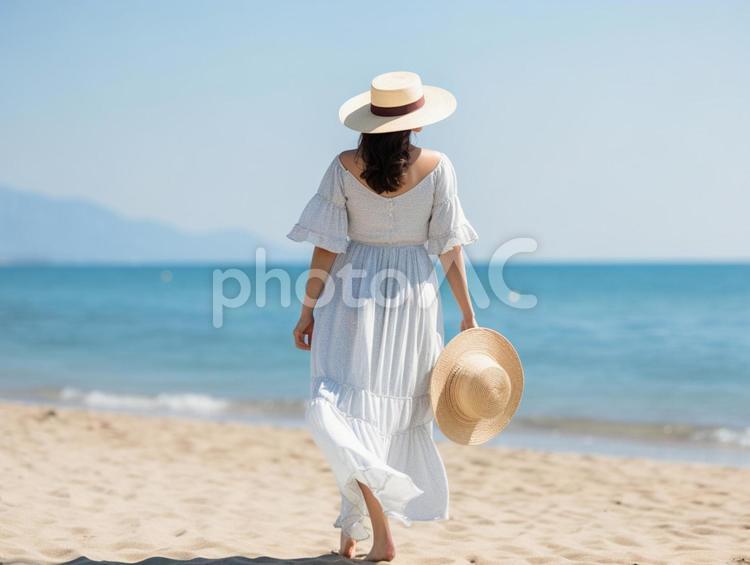 海と後ろ姿の女性 青空,海,ビーチの写真素材