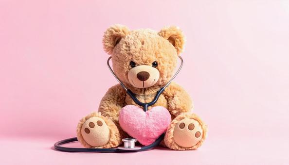 クマのぬいぐるみと聴診器　ヘルスケアの写真