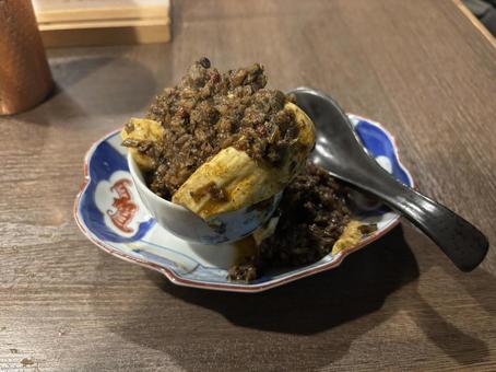 旨辛!こぼれ黒麻婆豆腐 旨辛!こぼれ黒麻婆豆腐の写真