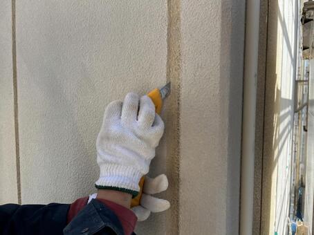 ALC壁シールカット様子① alc,コーキング,シーリングの写真素材