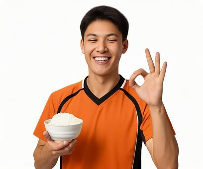 バレー姿で笑顔の男性のオッケーの指と白米 バレー姿で笑顔の男性のオッケーの指と白米の写真