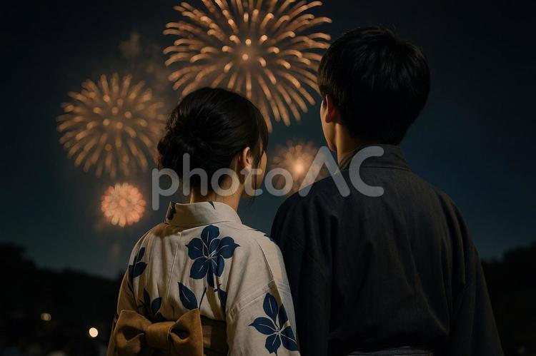 花火を見上げる高校生 日本,高校生,カップルの写真素材