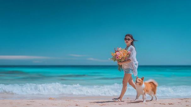 夏のビーチを彩る、花と女性の美しい横顔の写真