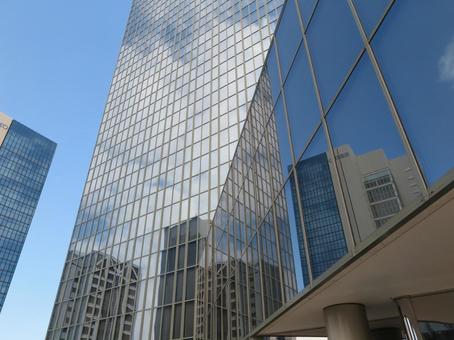 Buildings reflected in the window Buildings reflected in the window