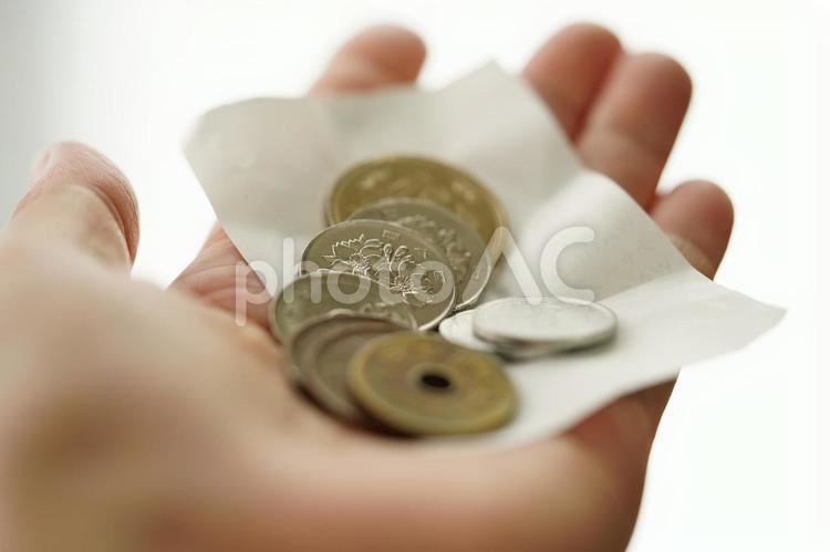 レシートとお釣りを受け取りました お金,お釣り,硬貨の写真素材