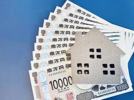 茶色い家の模型とお金 茶色い家の模型とお金 不動産,お金,紙幣の写真素材