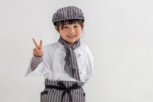 シェフの格好をした子ども シェフの格好をした子ども シェフ,子ども,職業体験の写真素材
