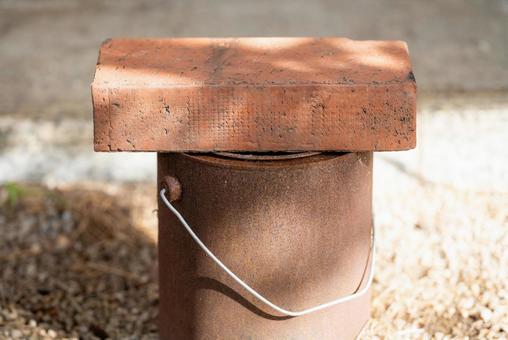 Bricks and metal bucket, JPG