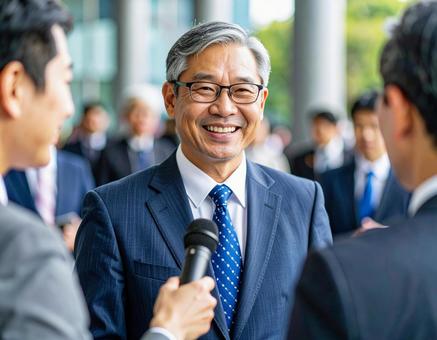 The smiling president confidently answers questions during an interview, top interview, business person, street interview, JPG