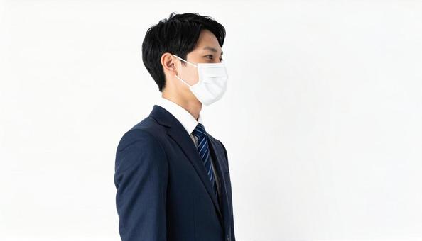 マスクをつける人 マスクをつける人の写真