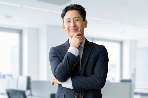 微笑む男性ビジネスマン 男性,ビジネス,人物の写真素材