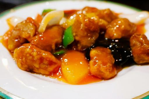 中華料理店の香港風酢豚 中華料理店の香港風酢豚 酢豚,豚肉,ピーマンの写真素材