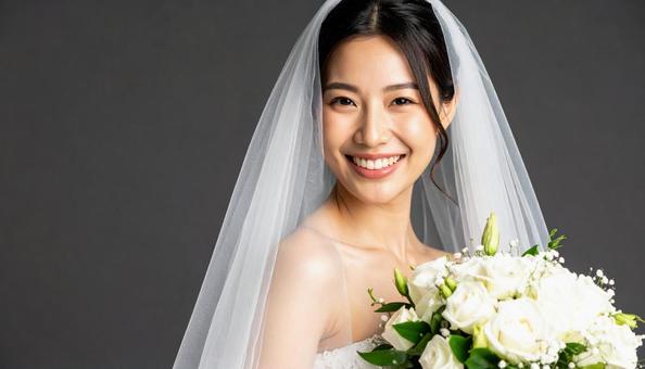 ベールとウエディング姿の花嫁 ブーケ ベールとウエディング姿の花嫁 ブーケの写真