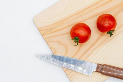 ミニトマトとナイフ、まな板 ミニトマト,トマト,野菜の写真素材