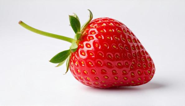 白い背景にへた付きのイチゴの写真