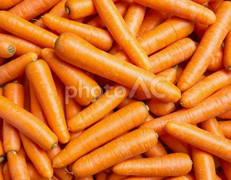 大量の人参を敷き詰めた背景素材　1 ニンジン,人参,野菜の写真素材