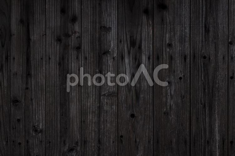 傷のある黒い木目の背景画像 黒,木目,黒い木目の写真素材