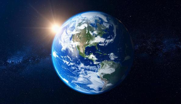 宇宙空間　地球と太陽の写真