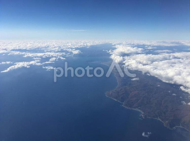 飛行機から見る陸と雲 青空,雲,空の写真素材