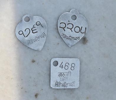 ゴールデンテンプル 荷物預かり証 ゴールデンテンプル 荷物預かり証 インド,観光地,ゴールデンテンプルの写真素材