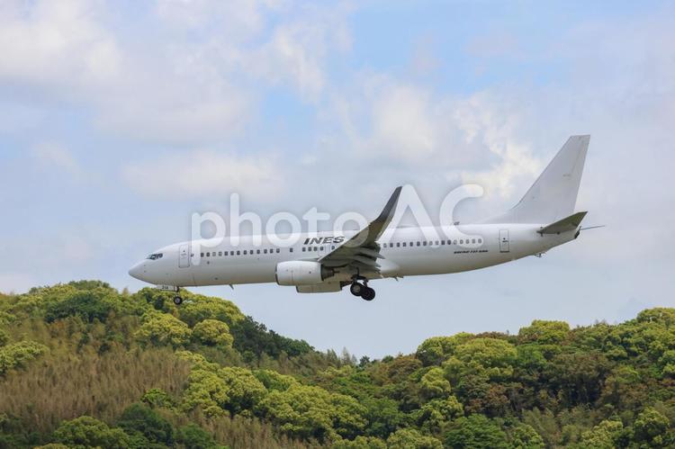 陽射しの中を走る機体 飛行機,航空機,旅客機の写真素材