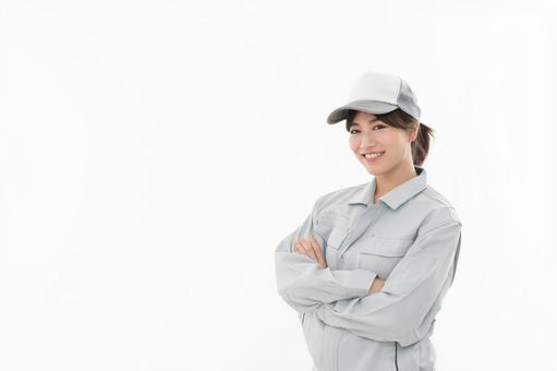 若い女性　作業着 女性,人物,作業服の写真素材